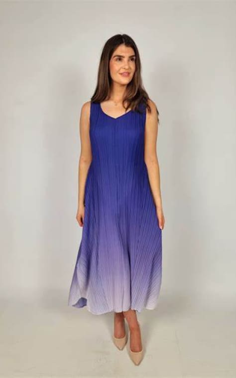 princess polly baby blue dress A long, flowing violet-to-seafoam ombre dress with white wave patterns on a  white mannequin on a marble floor. on Craiyon main image 1