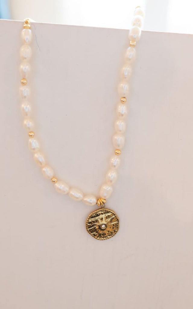 Twisted Baubles - Natural Pearl Necklace with Sun Charm