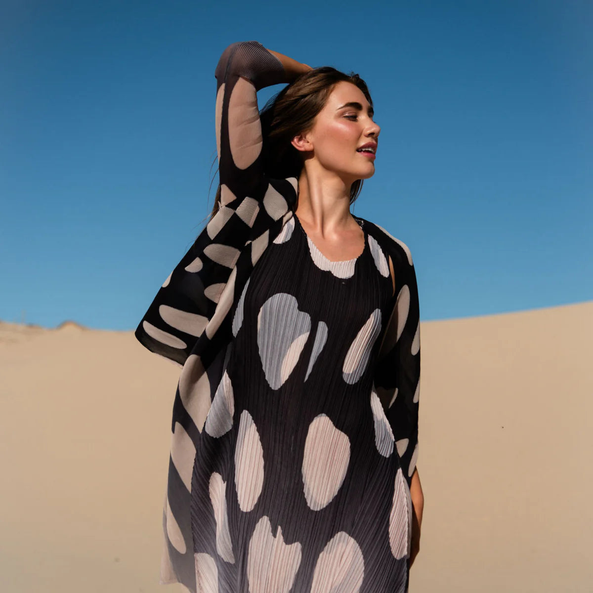 Alquema- Long Estrella Dress in Beige to Black Elliptical Spot