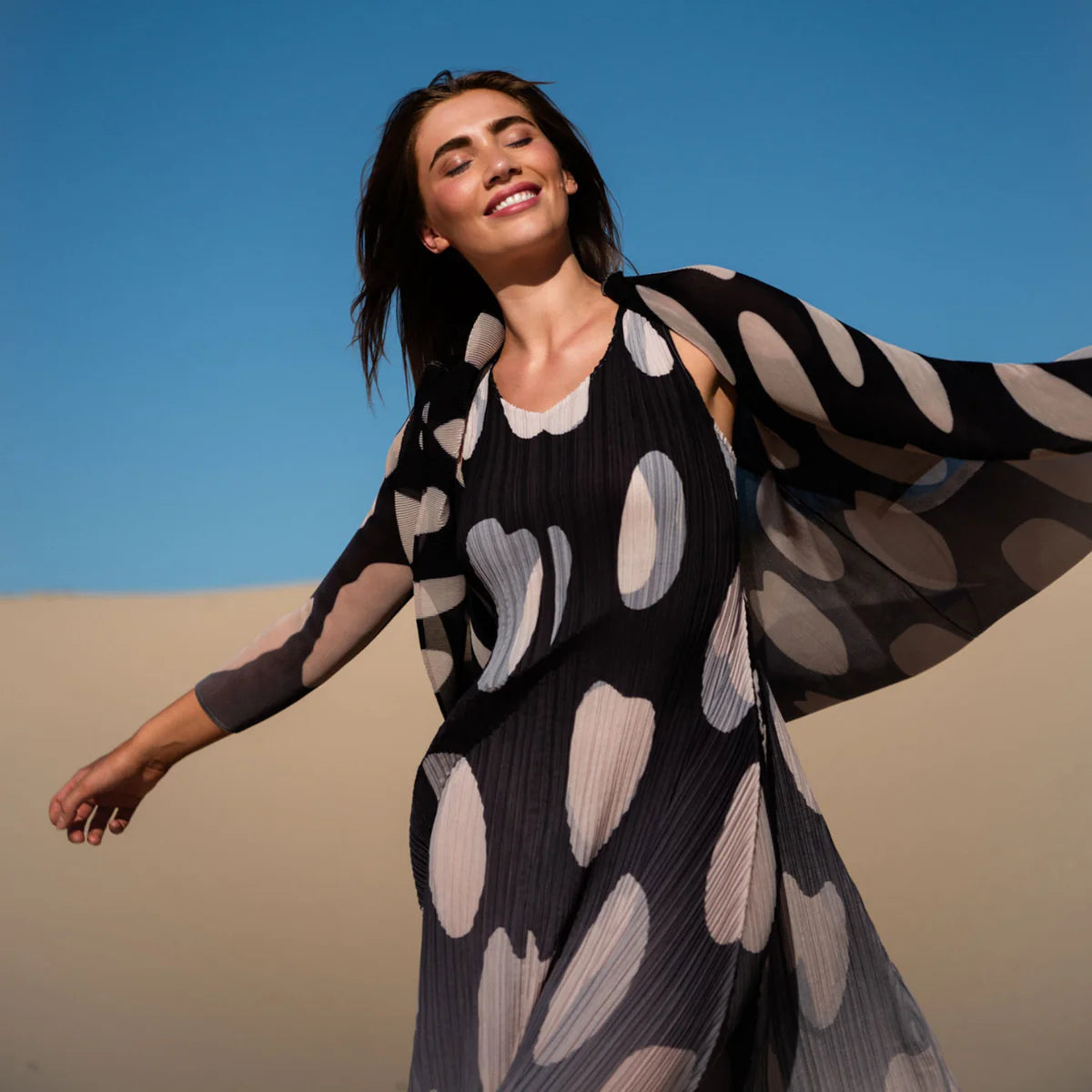 Alquema- Long Estrella Dress in Beige to Black Elliptical Spot